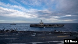 Theodore Roosevelt Carrier Strike Group và Nimitz Carrier Strike Group tại Biển Đông hôm 9 tháng Hai, 2021.