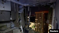 An interior view shows an apartment inside a residential building damaged during a Russian drone strike, in Kyiv, Ukraine, July 13, 2023. 