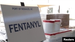 FILE - Packets of fentanyl and methamphetamine, seized from a truck crossing into Arizona from Mexico, are on display at the Port of Nogales, Arizona, Jan. 31, 2019. (Courtesy U.S. Customs and Border Protection/Handout via Reuters)