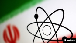 Illustration shows Atom symbol and Iran flag