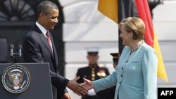 Obama ve Merkel: Kaddafi Gitmeli