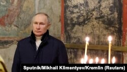 Tổng thống Nga Vladimir Putin dự lễ Giáng sinh của Chính thống giáo tại Điện Kremlin ở Moscow, Nga, ngày 7 tháng 1 năm 2023. (Ảnh do Điện Kremlin cung cấp)