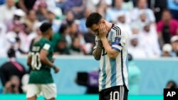 Argentina's Lionel Messi reacts disappointed during the World Cup group C soccer match between Argentina and Saudi Arabia at the Lusail Stadium in Lusail, Qatar, Tuesday, Nov. 22, 2022.