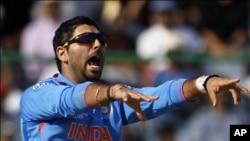 India's Yuvraj Singh appeals successfully for the wicket of The Netherlands' Wesley Baressi during their ICC Cricket World Cup group B match in New Delhi March 9, 2011. REUTERS/Adnan Abidi (INDIA - Tags: SPORT CRICKET)