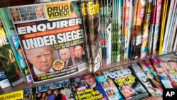 National Enquirer là một tờ báo lá cải chuyên đăng những chuyện giật gân về những người nổi tiếng và thường được bày bán trong các siêu thị ở Mỹ.