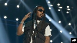 Foto Achiv: Takeoff, rape gwoup Migos la pefome pandan Spektak BET Experience Los Angeles la an 2019. 