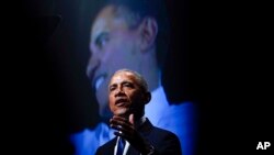 FILE - Former President Barack Obama speaks during a memorial service for former Senate Majority Leader Harry Reid at the Smith Center in Las Vegas, Jan. 8, 2022.