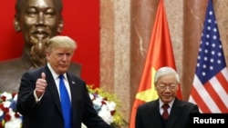 Ông Trump và ông Trọng tại Hà Nội, tháng Hai, 2019.