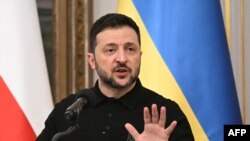 Ukraine's President Volodymyr Zelensky attends a joint press conference with the Polish President in Warsaw, Poland on January 15, 2025.