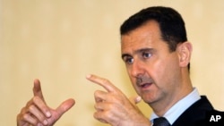 Tổng thống Syria Bashar al-Assad nói 'nếu chúng tôi muốn đầu hàng, chúng tôi đã đầu hàng ngày từ lúc đầu'.