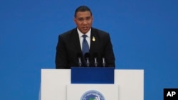 Jamaica's Prime Minister Andrew Holness delivers a speech at the opening ceremony of the China International Import Expo in Shanghai on Tuesday, Nov. 5, 2019. The sprawling import fair into its second year is meant to demonstrate China's willingness…