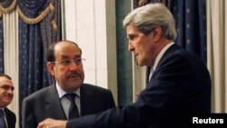 Ngoại trưởng Hoa Kỳ John Kerry gặp Thủ tướng Iraq Nouri al-Maliki tại Baghdad, ngày 24/3/2013.