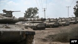 Xe tăng Merkava của quân đội Israel được điều động dọc biên giới Dải Gaza tại miền nam Israel, ngày 13/10/2023. 