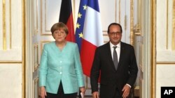 Tổng thống Pháp Francois Hollande và Thủ tướng Đức Angela Merkel tại điện Elysee, Paris, ngày 6/7/2015.