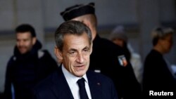 FILE PHOTO: FILE PHOTO: Appeal trial of former French president Sarkozy on corruption charges at Paris court