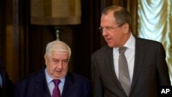 Ngoại trưởng Nga Sergey Lavrov (phải) gặp Ngoại trưởng Syria Walid al-Moallem tại Moscow, ngày 25/2/2013.