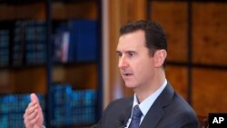 Tổng thống Syria Bashar al-Assad trong một cuộc phỏng vấn trên truyền hình ngày 25/9/2013.