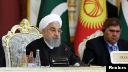 Tổng thống Iran Hassan Rouhani đọc diễn văn tại Hội nghị về Tương tác và Các Biện pháp Xây dựng Niềm tin ở Châu Á tại Dushanbe, Tajikistan, ngày 15 tháng 6, 2019. 