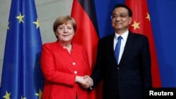 Thủ tướng Đức Angela Merkel và Thủ tướng Trung Quốc Lý Khắc Cường.