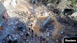 Aftermath of an Israeli strike on a house, in Rafah