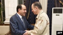 Thủ tướng Iraq Nouri al-Maliki và Chủ tịch ban Tham mưu Liên quân Đô đốc Mike Mullen tại Baghdad, ngày 2/8/2011