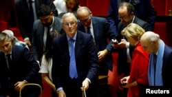 Lawmakers vote on no-confidence motion against the French government