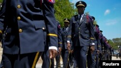 Manb Polis Nasyoal Ayiti a PNH. Foto: REUTERS/Swoan Parker (Pòtopresn. Ayiti)