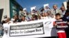 Turkish journalists, demanding freedom for cameraman Cuneyt Unal and TV correspondent Bashar Fahmi, who went missing while reporting from Syria, demonstrate in front of the Syrian Embassy in Ankara August 31, 2012. Unal crossed into Syria on August 20 wit