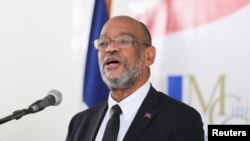 FILE - Haitian Prime Minister Ariel Henry speaks at a ceremony in Port-au-Prince, Haiti, Nov. 26, 2021. 