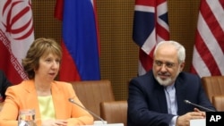 Trưởng ban Chính sách Đối ngoại EU Catherine Ashton (trái) và Ngoại trưởng Iran Mohammad Javad Zarif tại cuộc đàm phán về chương trình hạt nhân Iran, ngày 19/3/2014.