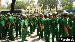 Chinese Tourists wear U shaped T-Shirts claiming China’s sovereigty of South China Sea at Vietnamese airport