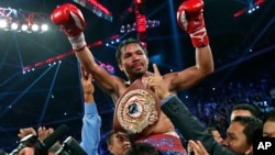 Ngôi sao quyền anh người Philippines Manny Pacquiao đánh bại võ sĩ người Mỹ Brandon Rios, đoạt đai vô địch hạng nhẹ của Tổ chức quyền anh Thế giới WBO.