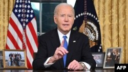 Tổng thống Hoa Kỳ Joe Biden tại Phòng Bầu dục của Nhà Trắng khi ông có bài phát biểu chia tay toàn quốc vào ngày 15 tháng 1 năm 2025.