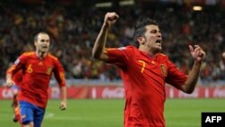 Cầu thủ David Villa vui mừng sau khi ghi bàn thắng trong trận tranh tài World Cup với Bồ Ðào Nha