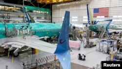 Boeing'in Washington eyaletinin Renton kasabasındaki fabrikasında imalat aşamasındaki bir 737 MAX uçağı.