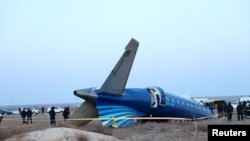 A view shows the wreckage of a passenger plane at the crash site near Aktau