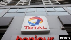 The logo of French oil and gas company Total is seen at a petrol station in Paris, France, February 8, 2021. REUTERS/Sarah Meyssonnier