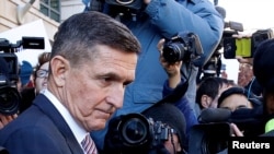 Cựu cố vấn an ninh quốc gia Michael Flynn rời tòa án ở Washington, Mỹ, ngày 18 tháng 12, 2018. 