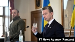 Swedish Defense Minister Pal Jonson holds a press conference with Ukraine's Defense Minister Rustem Umerov at Karlberg Palace in Stockholm, Sweden, Nov. 22, 2024. 