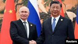 Putin ve Xi Pekin'deki görüşmesi- 18 Ekim 2023 (ARŞİV).