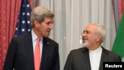 Ngoại trưởng Mỹ John Kerry và Ngoại trưởng Iran Mohammad Javad Zarif tại Lausanne, Thụy Sĩ, ngày 16/3/2015.