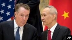 Đại diện thương mại Mỹ Robert Lighthizer và Phó Thủ tướng Trung Quốc Lưu Hạc, người đứng đầu hai phái đoàn đàm phán