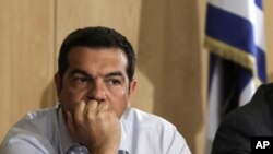 Thủ tướng Hy Lạp Alexis Tsipras thăm trụ sở Bộ giao thông vận tải ở Athens, ngày 12/8/2015.