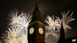 Fireworks explode over Elizabeth Tower housing the Big Ben clock to celebrate the New Year in London, Jan. 1, 2013.