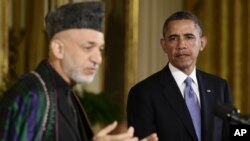 Tổng thống Barack Obama và Tổng thống Afghanistan Hamid Karzai tại cuộc họp báo ở Tòa Bạch Ốc, ngày 11/1/2013. (AP Photo/Charles Dharapak)