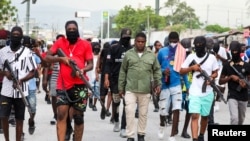 Jimmy "Barbecue" Cherizier leads a march against Prime Minister Ariel Henry, in Port-au-Prince