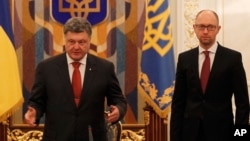 Tổng thống Ukraine Petro Poroshenko và Thủ tướng Ukraine Arseniy Yatsenyuk.