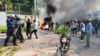 Protesters clash with riot police forces in front of the French Embassy in Kinshasa, Democratic Republic of Congo, Jan. 28, 2025. 