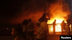 Anti-Mursi protesters are pictured during clashes with members of the Muslim Brotherhood and supporters of deposed Egyptian President Mohamed Mursi near Maspero, Egypt's state TV and radio station, near Tahrir square in Cairo July 5, 2013. Seventeen peopl